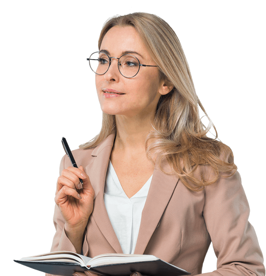 A professional woman wearing glasses and a beige blazer holds a notebook and pen, looking thoughtful and confident. The image represents Stratify’s 30 years of growth and partnership with clients, symbolizing innovation, teamwork, and remote collaboration.
